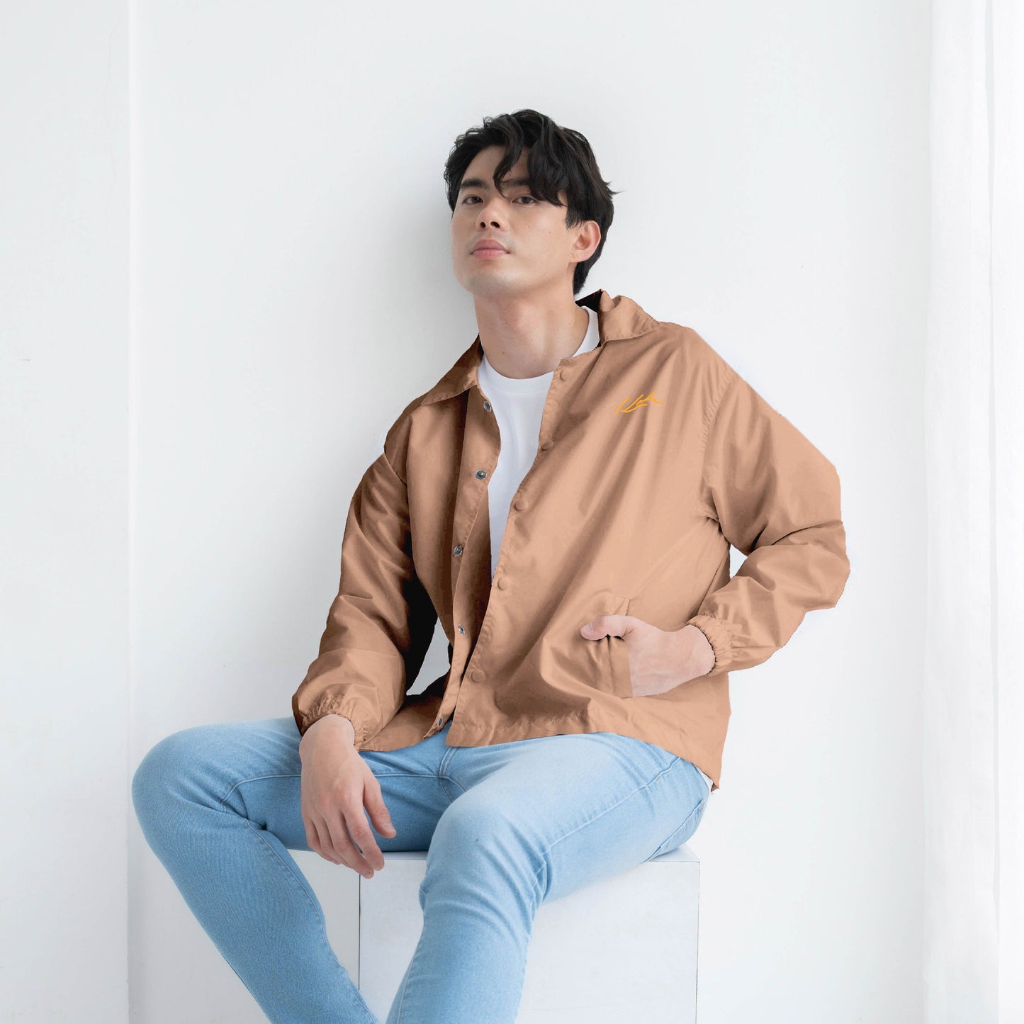 Jaket Coach
