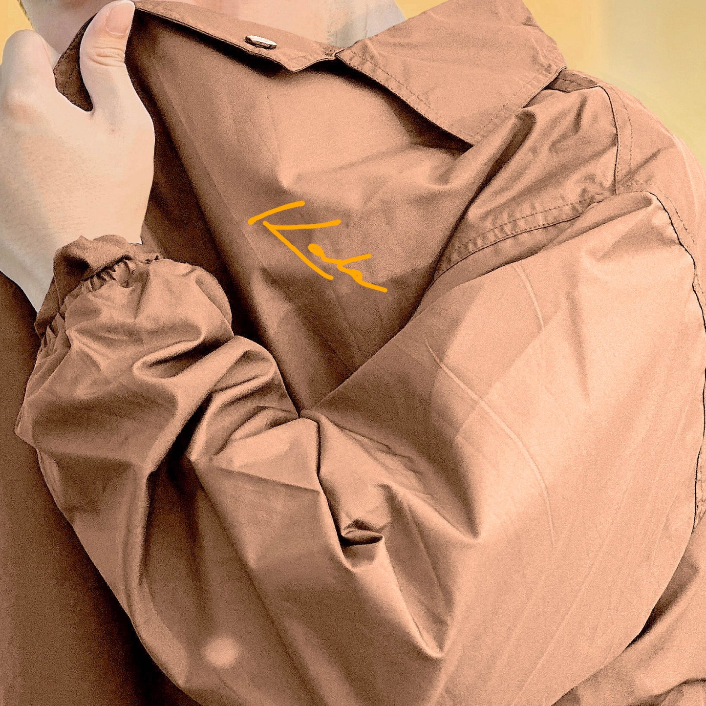 Jaket Coach