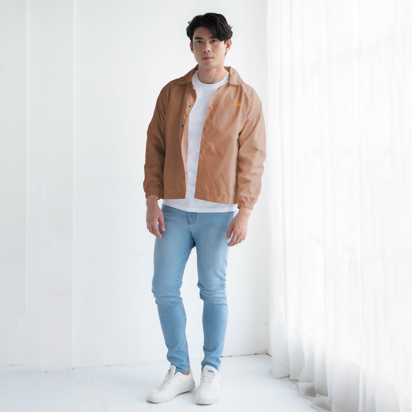 Jaket Coach
