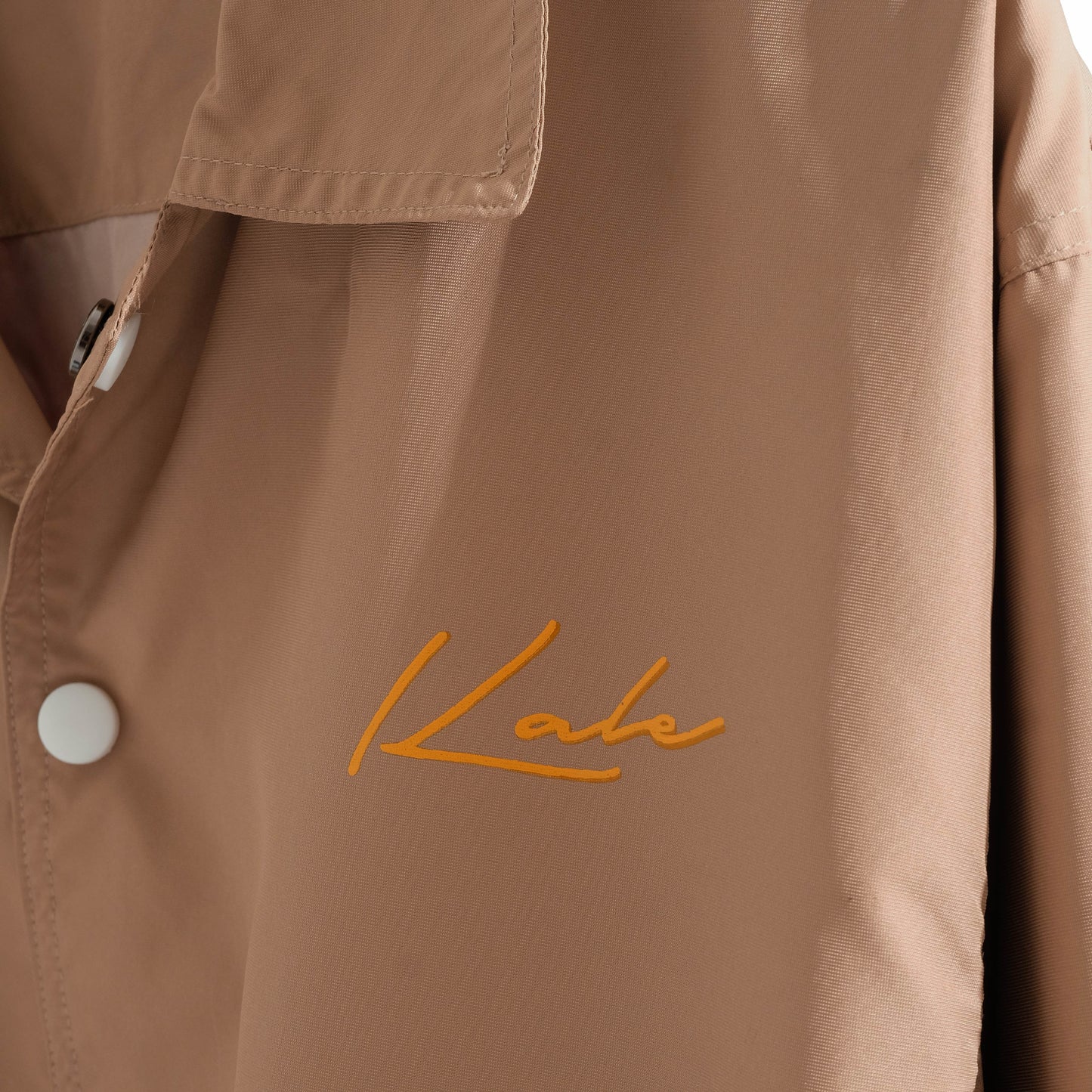 Jaket Coach
